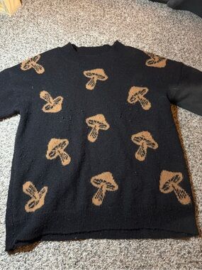 No Boundaries Black Sweater with Tan Mushroom Motif